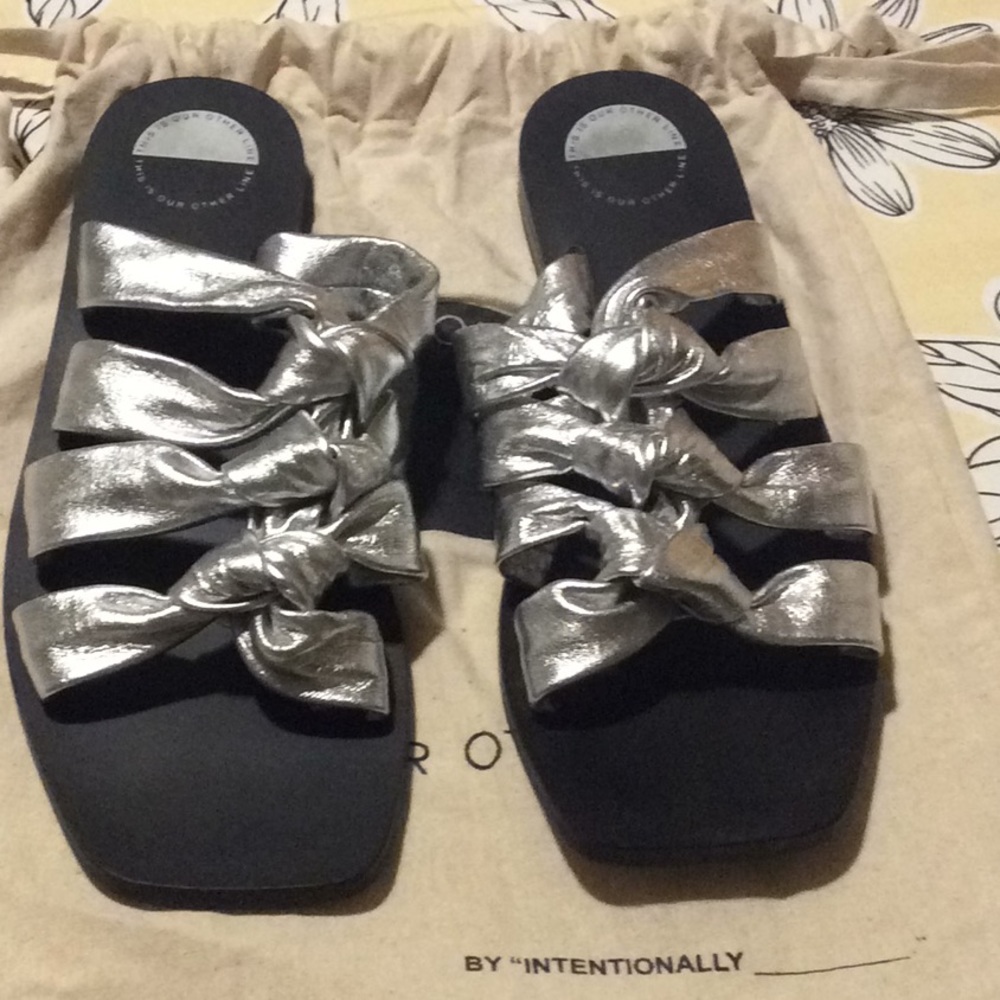 Silver slide sandals by One